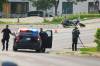 Mike Deal / Winnipeg Free Press
                                Winnipeg police investigate a collision between a white van and a motorcycle at Talbot Avenue and Levis Street on Wednesday.