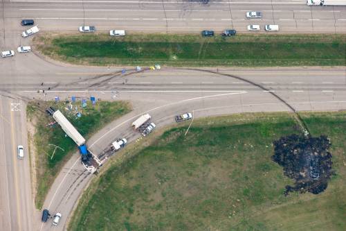 MIKAELA MACKENZIE / WINNIPEG FREE PRESS
                                The site of a crash between a bus and a semi-trailer, which killed 15 seniors, on the Trans-Canada Highway north of Carberry.