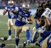 John Woods / THE CANADIAN PRESS
                                RB Brady Oliveira scores a touchdown against the Hamilton Tiger-Cats in the Bombers’ season-opening victory last Friday.