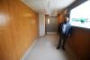 Roger Stearns, General Superintendent for PCL Constructors, looks out the window of a new senior visitation pod when they were unveiled in September 2020. (John Woods / Winnipeg Free Press files)