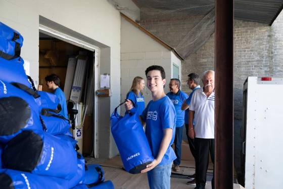 Zac Weinberg, founder of the ZacPac project at a community volunteering event in the Exchange District for ZacPacs, which are filled with survival gear for those experiencing homelessness. (Jessica Lee / Winnipeg Free Press)