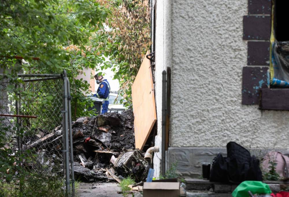 JESSICA LEE / WINNIPEG FREE PRESS
A 19-year-old neighbour, who has lived down the street from the homicide scene with her parents and sibling for about a year, said the home had been used by squatters for the past few months after regular tenants moved out.