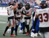 BTHE CANADIAN PRESS/John Woods
                                B.C. Lions’ Sione Teuhema (47) celebrates his sack of Winnipeg Blue Bombers quarterback Zach Collaros in Winnipeg Thursday.