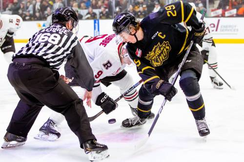 Brandon Wheat Kings forward Nate Danielson (29) faces off against Red Deer Rebels forward Jayden Grubbe (9). (Rob Wallator/Red Deer Rebels)
