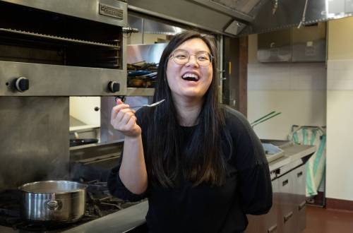 JESSICA LEE / WINNIPEG FREE PRESS
                                Lam learned to make congee by watching her mother – and YouTube.