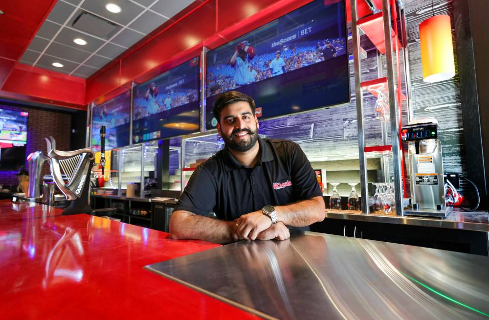 RUTH BONNEVILLE / WINNIPEG FREE PRESS
Saiyam Trehan first tried the wings at St. Louis Bar & Grill in 2021 — now he owns his own restaurant.