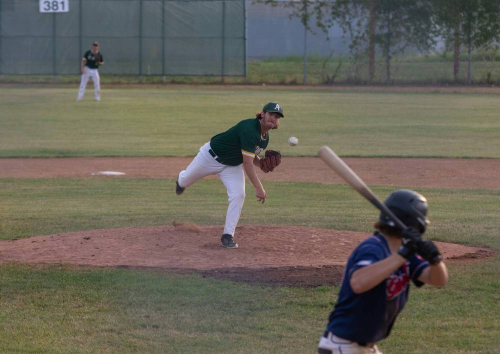 JESSICA LEE / WINNIPEG FREE PRESS
St. James A’s pitcher Devon Cook pitches against the Elmwood Giants Wednesday at Koskie Field.