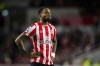 FILE - Brentford's Ivan Toney during the Premier League soccer match between Brentford and Bournemouth at the Community Stadium in London, England, Saturday, Jan. 14, 2023. Toney has been suspended for eight months by the English Football Association for breaching its betting rules. The FA says the England international was banned “from all football and football-related activity with immediate effect” until Jan. 16, 2024. He was also fined 50,000 pounds ($62,000). Toney had faced 262 charges of breaching the FA’s betting rules between late February 2017 and late January 2021 but the FA said it “withdrew 30 of these breaches and he admitted to the remaining 232.” (AP Photo/Leila Coker, File)