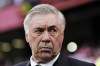 Real Madrid's head coach Carlo Ancelotti waits for the start of a Spanish La Liga soccer match between Sevilla and Real Madrid at the Ramon Sanchez Pizjuan stadium in Seville, Spain, Saturday, May 27, 2023. (AP Photo/Jose Breton)