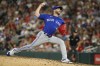 FILE -Toronto Blue Jays relief pitcher Anthony Bass throws to a Minnesota Twins batter during the ninth inning of a baseball game Thursday, Aug. 4, 2022, in Minneapolis. Toronto Blue Jays pitcher Anthony Bass apologized Tuesday, May 30, 2023 for sharing a homophobic social media post on his Instagram account. (AP Photo/Bruce Kluckhohn, File)