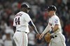 Houston Astros' Alex Bregman (2) and Yordan Alvarez (44) celebrate after a baseball game against the Los Angeles Angels Saturday, June 3, 2023, in Houston. The Astros won 9-6. (AP Photo/David J. Phillip)