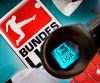 FILE - The logo of German Football League Bundesliga is seen through a camera prior to a press conference in Frankfurt, Germany, Oct. 9, 2007. The German soccer league (DFL) is appointing two more men to take over as chief executive officers from two men who took over from a woman last year. (AP Photo/Michael Probst, File)