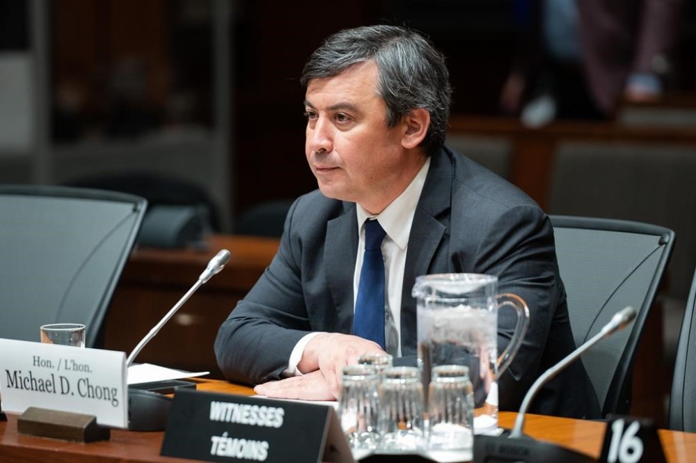 Conservative MP for Wellington-Halton Hills Michael Chong prepares to appear as a witness at the Standing Committee on Procedure and House Affairs (PROC) in Ottawa, Tuesday, May 16, 2023. A former top adviser to the prime minister says an intelligence memo warning about Beijing's alleged targeting of Chong and his family was produced after he had retired. THE CANADIAN PRESS/Spencer Colby