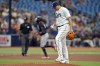 Tampa Bay Rays pitcher Yonny Chirinos reacts as Minnesota Twins' Carlos Correa runs around the bases following his solo home run during the fourth inning of a baseball game Thursday, June 8, 2023, in St. Petersburg, Fla. (AP Photo/Chris O'Meara)