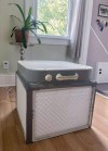 A Corsi-Rosenthal air purifier built by Liz Hradil is seen at her home in Syracuse, N.Y. after the wildfire smoke covered much of New York Wednesday, June 7, 2023. The method involves taping four air filters together with a box fan. Experts say the DIY method is highly effective against filtering air indoors against wildfire smoke. (Liz Hradil via AP)