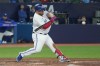 Toronto Blue Jays' Alejandro Kirk hits an RBI double off Houston Astros starting pitcher Framber Valdez during fifth inning American League MLB baseball action in Toronto on Thursday, June 8, 2023. THE CANADIAN PRESS/Chris Young