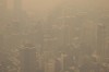 FILE - New York City is engulfed in haze seen from the Empire State Building observatory, June. 7, 2023, in New York. Thick, smoky air from Canadian wildfires made for days of misery in New York City and across the U.S. Northeast this week. But for much of the rest of the world, breathing dangerously polluted air is an inescapable fact of life — and death. (AP Photo/Yuki Iwamura, File)