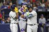 Tampa Bay Rays' Isaac Paredes, right, celebrates after his three-run home run with Randy Arozarena, left, in front of Texas Rangers catcher Jonah Heim, center, during the third inning of a baseball game Friday, June 9, 2023, in St. Petersburg, Fla. (AP Photo/Mike Carlson)