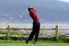 FILE - Tiger Woods drives the 18th hole on his way to winning the 100th U.S. Open Golf Championship at the Pebble Beach Golf Links in Pebble Beach, Calif., Sunday, June 18, 2000. The U.S. Open returns to California for the 15th time. (AP Photo/Elise Amendola, File)