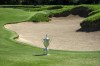 FILE - The championship trophy is displayed next to a bunker at the 18th hole during the First Look for the 123rd U.S. Open Championship at Los Angeles Country Club, Monday, Sept. 26, 2022, in Los Angeles. The final three holes are par 4s that average 518 yards. The U.S. Open starts Thursday, June 15, 2023. (AP Photo/Ringo H.W. Chiu, File)