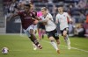 Colorado Rapids defender Moise Bombito (64) and San Jose Earthquakes forward Benji Kikanovic (28) in the first half of an MLS soccer match in Commerce City, Colo., on June 3, 2023 THE CANADIAN PRESS/AP, David Zalubowski