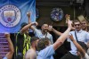 Supporters of Manchester City cheer on the Istiklal street in Istanbul, Turkey, Saturday, June 10, 2023, ahead of the Champions League final soccer match between Manchester City and Inter Milan. (AP Photo/Khalil Hamra)