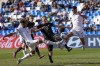 Joshua Wynder, left, and Justin Che, right, of the United States fight for the ball against New Zealand's Fin Conchie during a FIFA U-20 World Cup round of 16 soccer match at the Malvinas Argentinas stadium in Mendoza, Argentina, Tuesday, May 30, 2023. (AP Photo/Ricardo Mazalan)