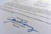 FILE - Part of a Nov. 6, 2016, letter from FBI Director James Comey to Congress is photographed in Washington on Nov. 6, 2016. Comey told Congress that a review of new Hillary Clinton emails has 