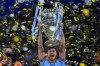 Manchester City's Ruben Dias celebrates with the trophy after winning the Champions League final soccer match between Manchester City and Inter Milan at the Ataturk Olympic Stadium in Istanbul, Turkey, Sunday, June 11, 2023. Manchester City won 1-0. (AP Photo/Manu Fernandez)
