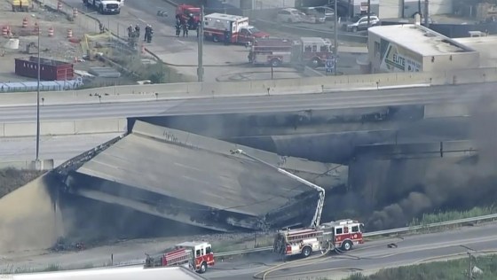 This screen grab from video provided by WPVI-TV/6ABC shows the collapsed section of I-95 with fire trucks on the scene in Philadelphia, Sunday. (WPVI-TV/6ABC via The Associated Press)