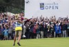 Nick Taylor, right, of Canada reacts with his caddie after winning the Canadian Open championship during a sudden death playoff in Toronto on Sunday, June 11, 2023. THE CANADIAN PRESS/Nathan Denette