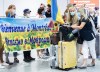 Ukrainian nationals fleeing the ongoing war in Ukraine arrive at Trudeau Airport in Montreal, Sunday, May 29, 2022. Stakeholders and experts say it may be time to offer more permanent status to Ukrainians who fled to Canada from the Russian invasion, but Canada will need to consult carefully with the Ukrainian government first. THE CANADIAN PRESS/Graham Hughes