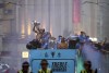 Manchester City's Ruben Dias and Erling Haaland celebrate during the parade to celebrate winning the Premier League, FA Cup and Champions League in Manchester, England, Monday June 12, 2023. (David Davies/PA via AP)