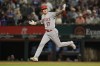Los Angeles Angels' Shohei Ohtani runs the bases after hitting a two-run home run during the 12th inning of a baseball game against the Texas Rangers, Monday, June 12, 2023, in Arlington, Texas. (AP Photo/Sam Hodde)