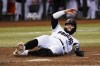 Arizona Diamondbacks' Emmanuel Rivera scores a run against the Philadelphia Phillies during the fourth inning of a baseball game Monday, June 12, 2023, in Phoenix. (AP Photo/Ross D. Franklin)