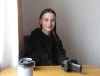 Katerina Mischenko, who escaped to Kyiv after the fall of her home town of Mariupol to Russia, speaks to The Canadian Press from her apartment in Kyiv in this photo taken Monday, June 12, 2023. THE CANADIAN PRESS/Bill Graveland
