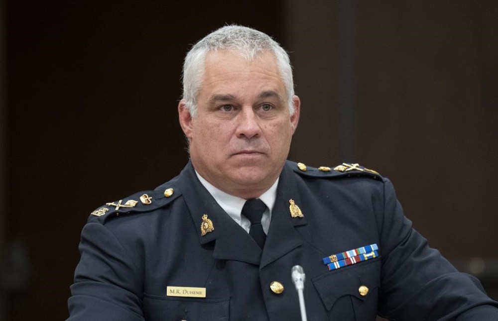 Acting RCMP Commissioner Mike Duheme waits to appear before the Procedure and House Affairs committee, in Ottawa, Tuesday, June 13, 2023. THE CANADIAN PRESS/Adrian Wyld