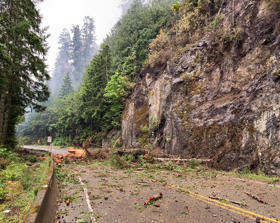 Debris is strewn across Highway 4 on Vancouver Island in a Tuesday, June 13, 2023, handout photo. The highway has been cut because of the Cameron Bluffs wildfire since June 6 and isn't expected to fully open until mid-July. THE CANADIAN PRESS/HO-B.C. Ministry of Transportation and Infrastructure, *MANDATORY CREDIT*