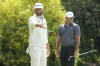 Dustin Johnson, left, and Brooks Koepka measure their putts on the third green during a practice round of the U.S. Open golf tournament at Los Angeles Country Club, Monday, June 12, 2023, in Los Angeles. (AP Photo/Marcio Jose Sanchez)