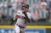 Arizona Diamondbacks left fielder Corbin Carroll runs safely to third during the first inning of a baseball game against the Detroit Tigers, Sunday, June 11, 2023, in Detroit. (AP Photo/Carlos Osorio)