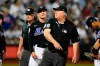 Umpire Bill Miller, right, ejects New York Mets relief pitcher Drew Smith, center, during the seventh inning of a baseball game against the New York Yankees Tuesday, June 13, 2023, in New York. (AP Photo/Frank Franklin II)