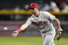 Philadelphia Phillies first baseman Kody Clemens tosses the ball to the pitcher covering first base for the out on Arizona Diamondbacks' Pavin Smith during the fourth inning of a baseball game Tuesday, June 13, 2023, in Phoenix. (AP Photo/Ross D. Franklin)