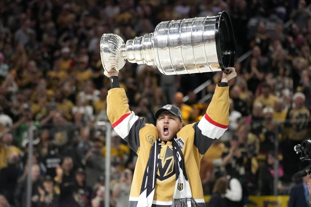 Vegas Golden Knights center William Karlsson skates with the Stanley Cup after the Knights defeated the Florida Panthers 9-3 in Game 5 of the NHL hockey Stanley Cup Finals Tuesday, June 13, 2023, in Las Vegas. The Knights won the series 4-1. (AP Photo/John Locher)