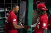 Cincinnati Reds' Will Benson (30) celebrates with Elly De La Cruz (44) after hitting a walk-off, two-run home run against the Los Angeles Dodgers in the ninth inning of a baseball game in Cincinnati, Wednesday, June 7, 2023. This was Benson's first major league home run (AP Photo/Jeff Dean)