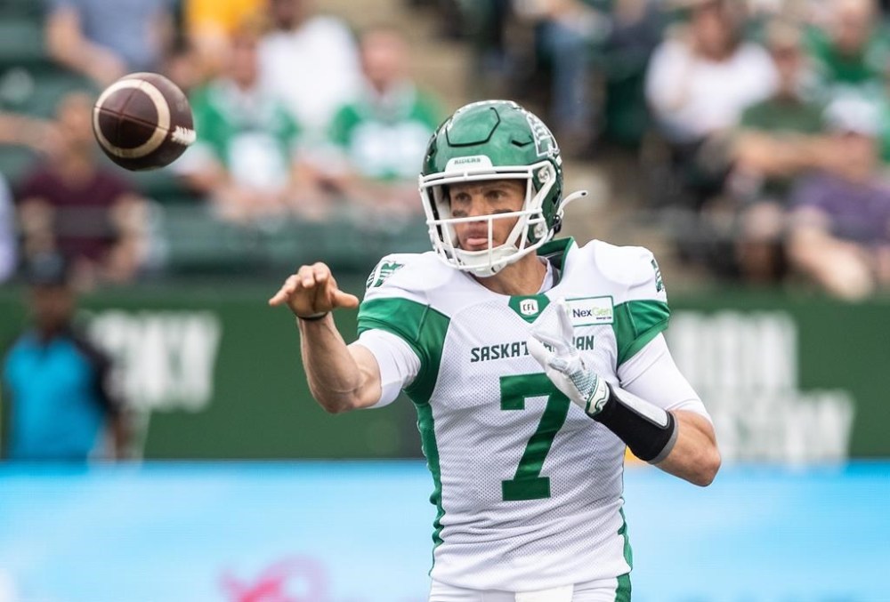 Saskatchewan Roughriders quarterback Trevor Harris (7) makes the throw against the Edmonton Elks during first half CFL action in Edmonton, Alta., on Sunday June 11, 2023. He might be ailing somewhat, but Harris is expected to play Friday night in the CFL team's home opener. THE CANADIAN PRESS/Jason Franson.