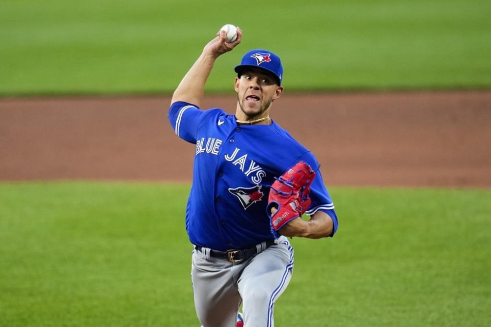 Toronto Blue Jays starting pitcher Jose Berrios throws a pitch to the Baltimore Orioles during the fourth inning of a baseball game, Wednesday, June 14, 2023, in Baltimore. (AP Photo/Julio Cortez)