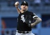 Chicago White Sox starting pitcher Mike Clevinger throws to a Los Angeles Dodgers batter during the first inning of a baseball game in Los Angeles, Wednesday, June 14, 2023. (AP Photo/Alex Gallardo)