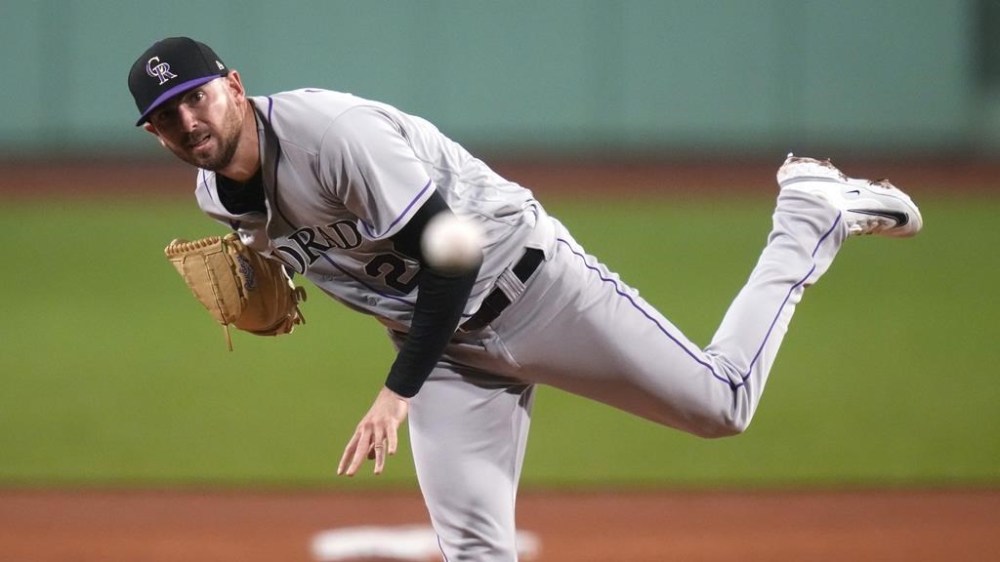 Colorado Rockies starting pitcher Austin Gomber watches a throw to a Boston Red Sox batter during the first inning of a baseball game at Fenway Park, Wednesday, June 14, 2023, in Boston. (AP Photo/Charles Krupa)