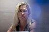 FILE - Rep. Marjorie Taylor Greene, R-Ga., listens during an event at the Capitol in Washington, June 13, 2023. Moments after Donald Trump pleaded not guilty to federal charges that he hoarded classified documents and then conspired to obstruct an investigation about it, the Republicans in Congress had his back. Trump's mounting legal jeopardy has quickly become a political rallying cry as they rush to stand by the indicted former president. (AP Photo/Amanda Andrade-Rhoades, File)