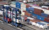 FILE - Shipping containers are moved at the Port of Lyttelton near Christchurch, New Zealand, on Sept. 17, 2020. New Zealand's economy has dipped into recession as higher interest rates take their toll, new figures released Thursday, June 15, 2023 show. (AP Photo/Mark Baker, File)